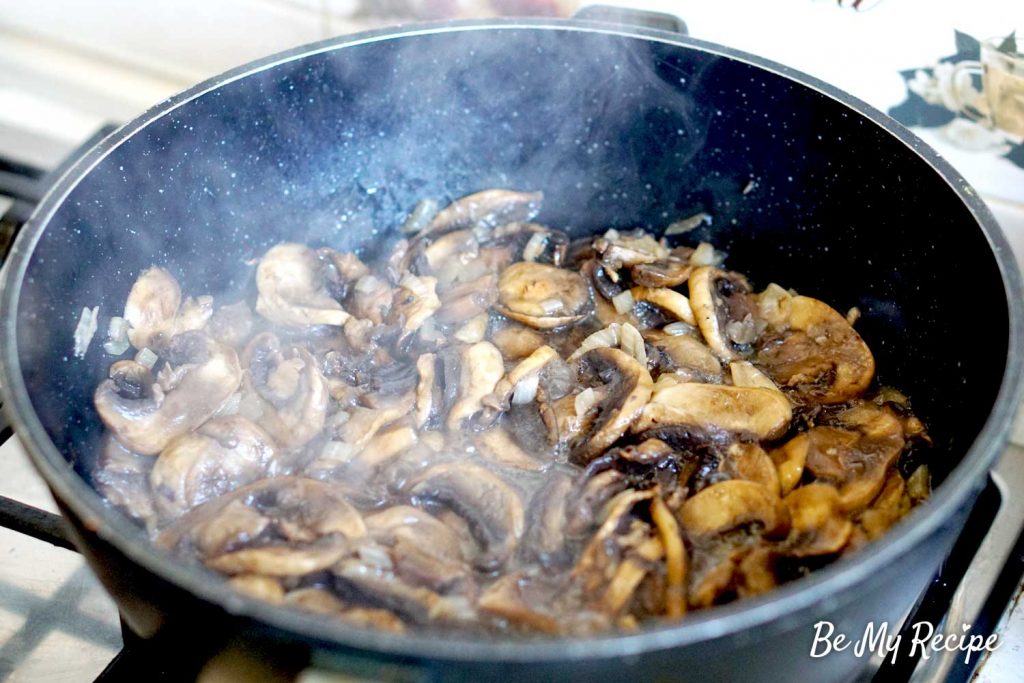 sauteed mushrooms in a pan for the creamy mushroom sauce