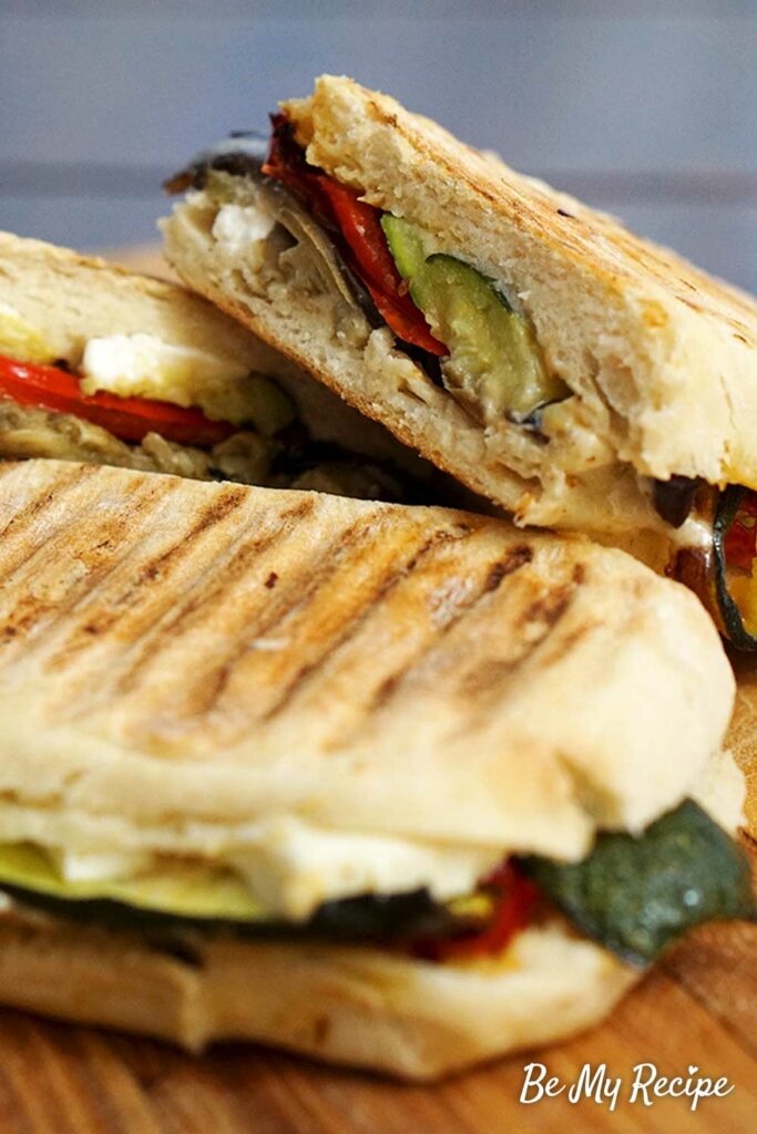 Grilled vegetables panini with tahini sauce and feta.