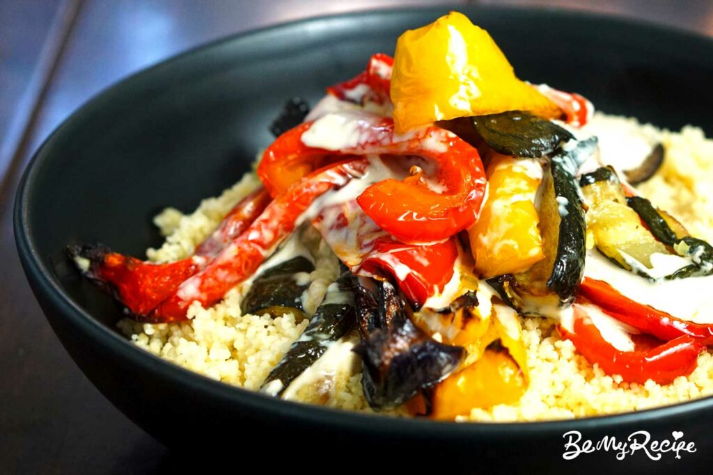 Couscous with roasted vegetables and tahini sauce