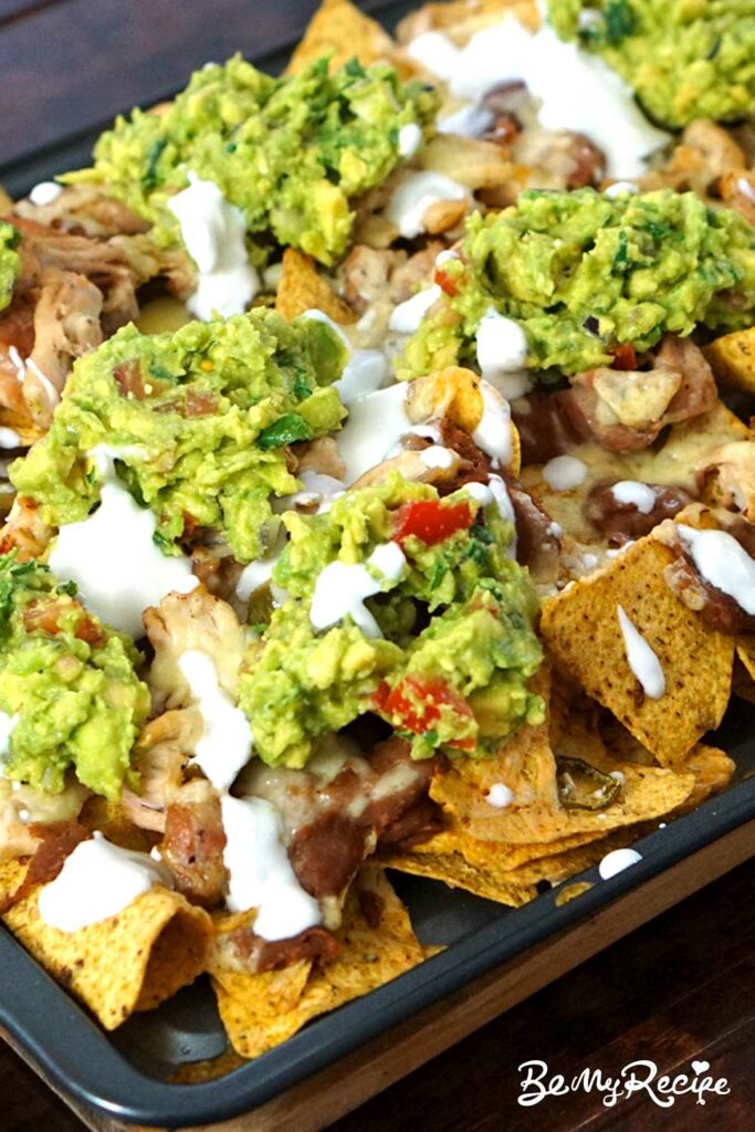 Loaded nachos with toppings.