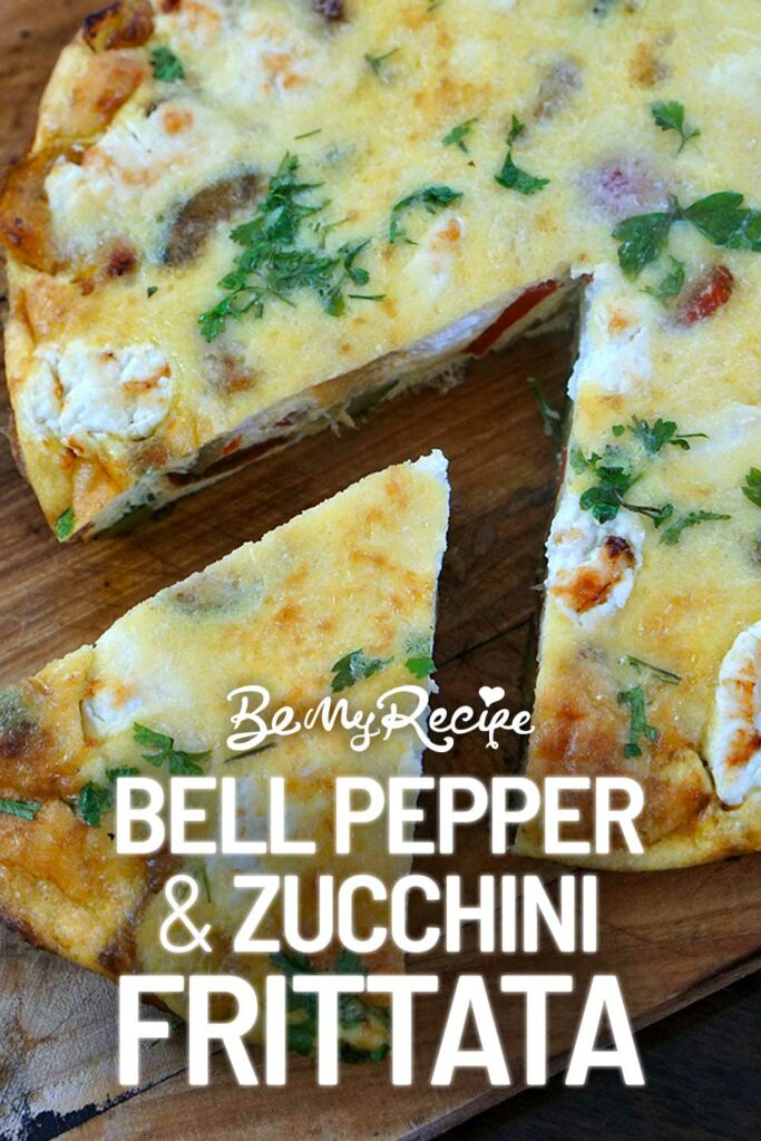 Bell Pepper Zucchini Frittata (sliced on a wooden board).