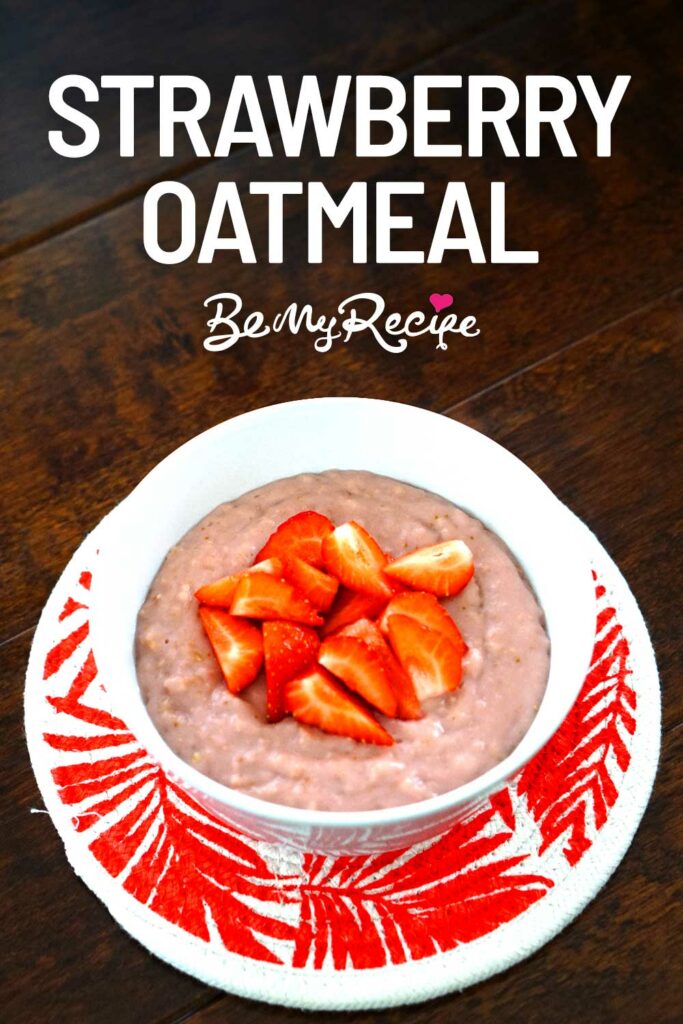 Strawberry oatmeal topped with fresh strawberries