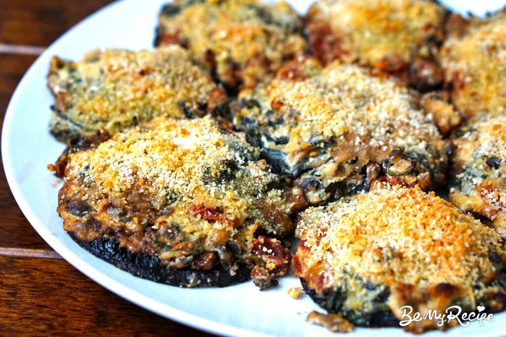 Stuffed mushrooms with ricotta, parmesan, spinach, and sundried tomatoes.
