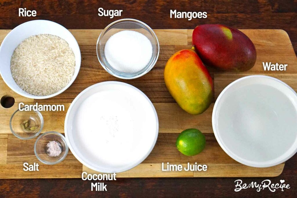 Mango coconut rice pudding ingredients on a board.