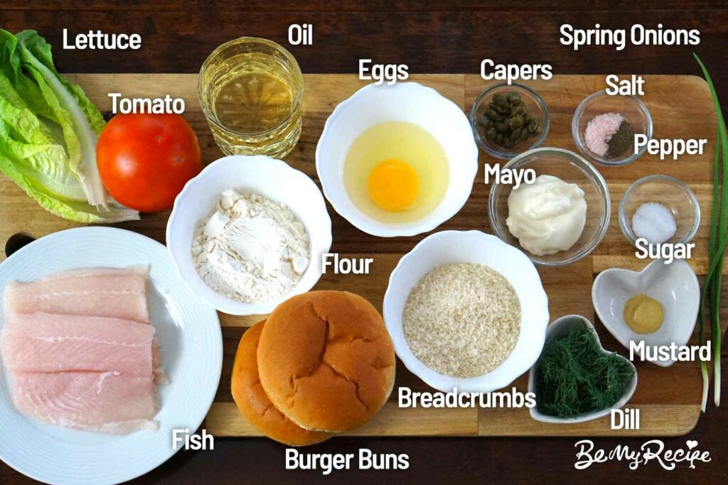 Fish burger ingredients on a board