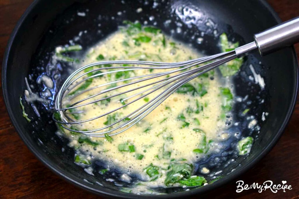 Beaten egg with parmesan, basil, and garlic