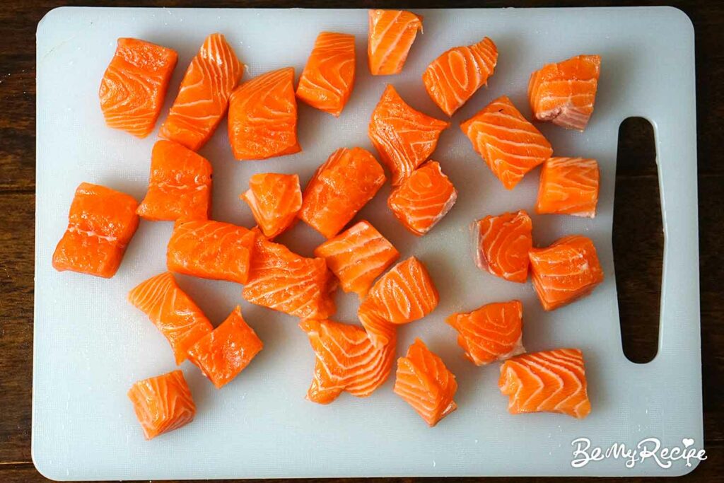 Cutting up the salmon into cubes