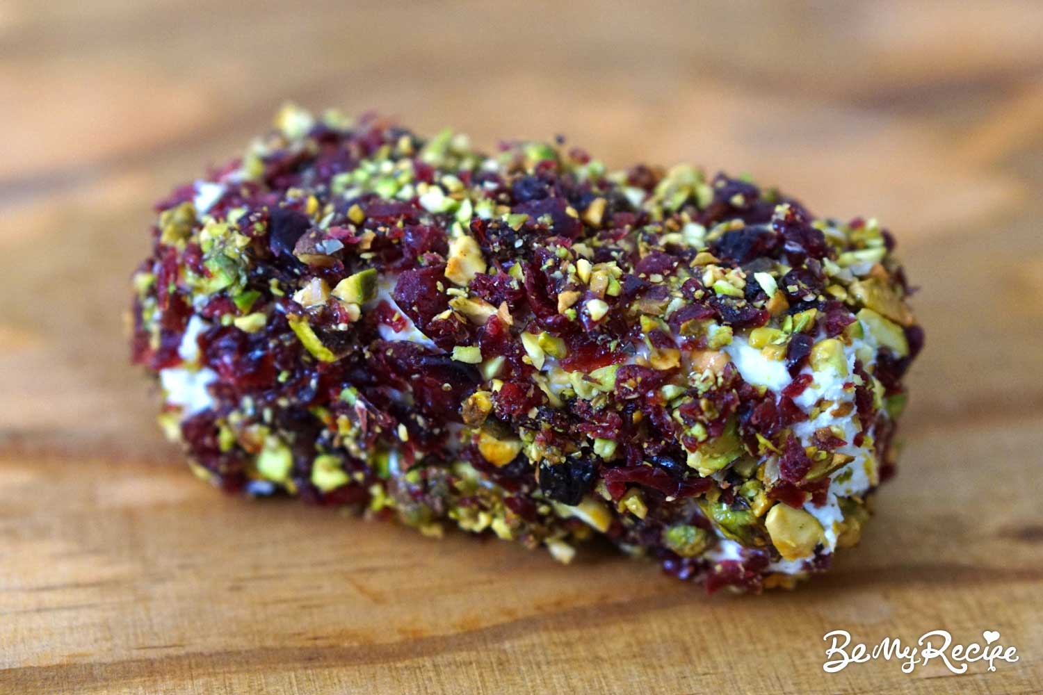 How to Upgrade a Goat Cheese Log with Pistachios, Cranberries, and Honey