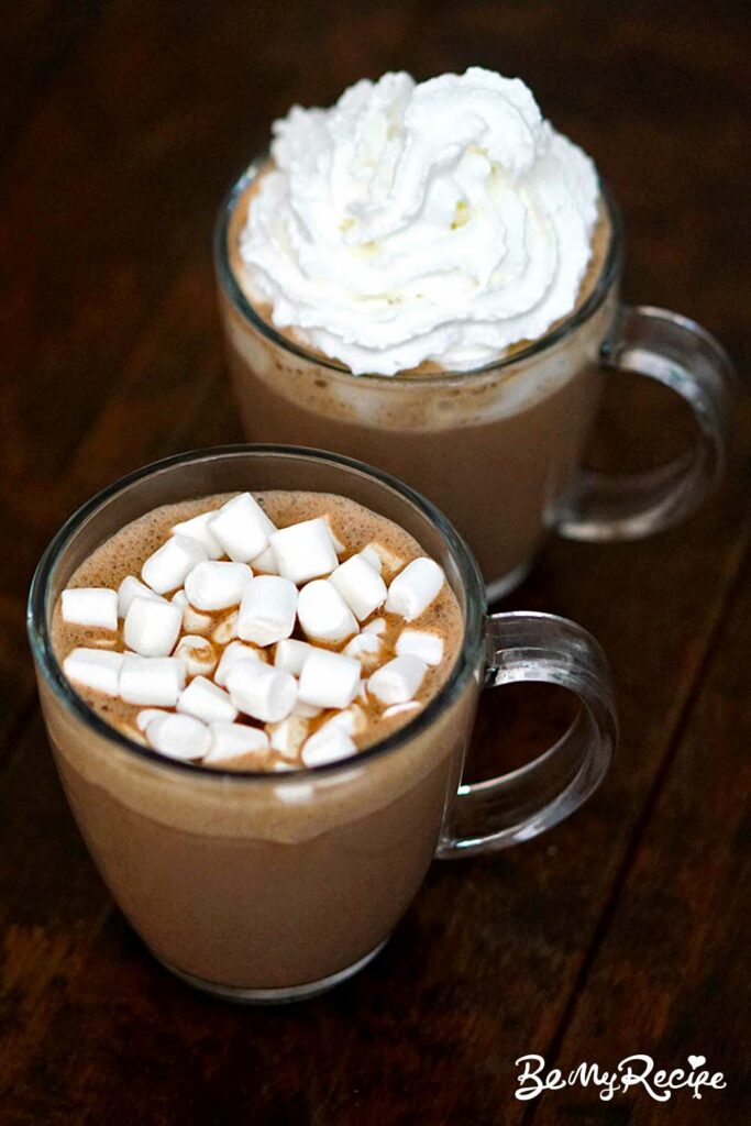 Homemade hot chocolate with mini marshmallows and whipped cream.