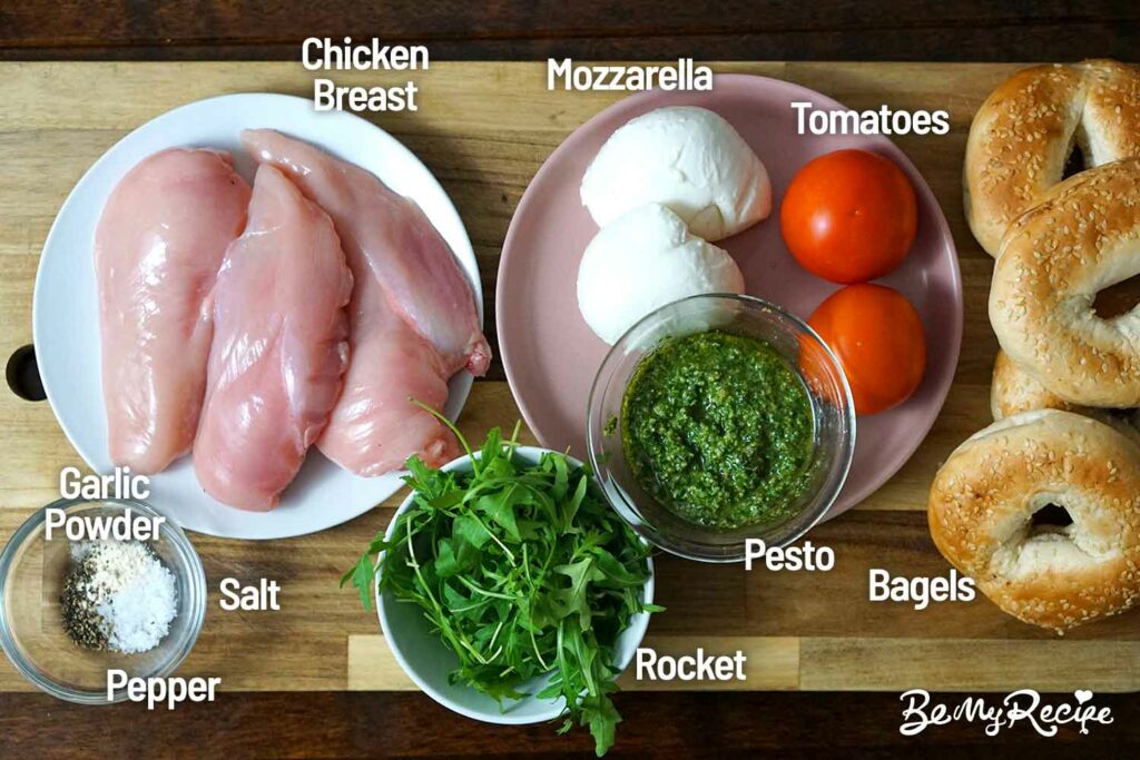 Ingredients board for the bagel with pesto chicken recipe