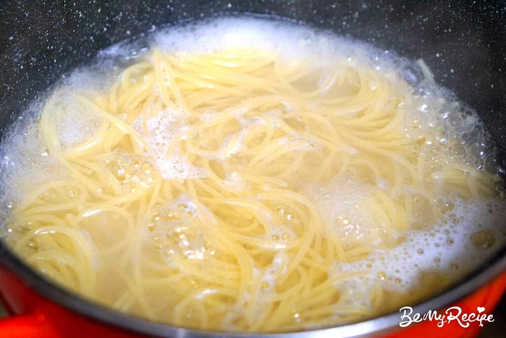 Boiling the pasta in salted water