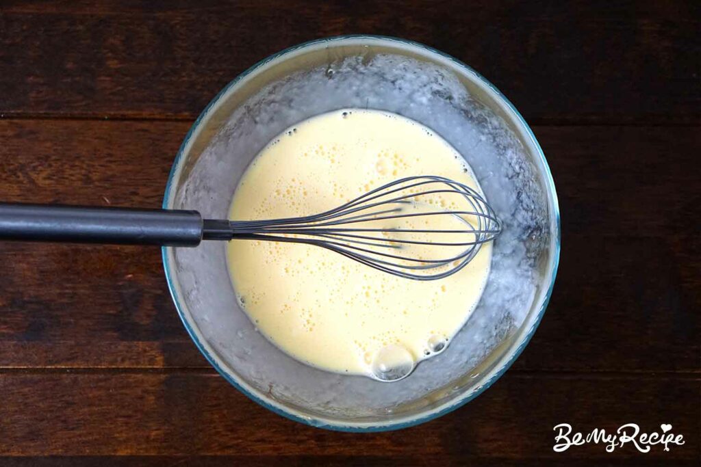 Whisking the eggs and cream