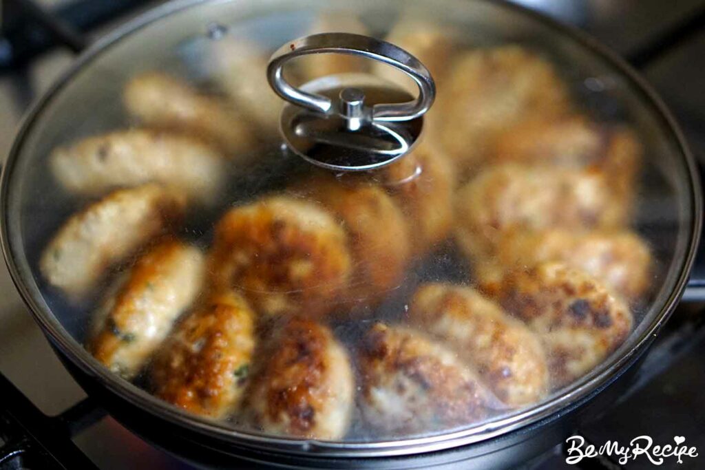 Cooking the chicken meatball patties