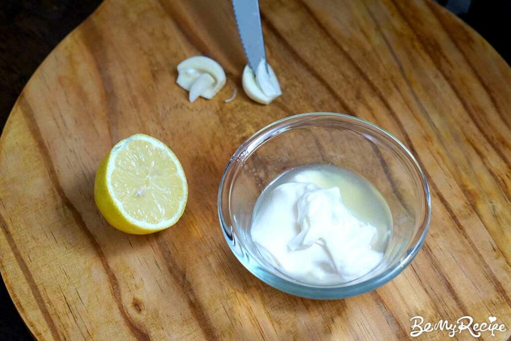 Making the lemon mayo aioli (and showing how to remove the garlic germ).