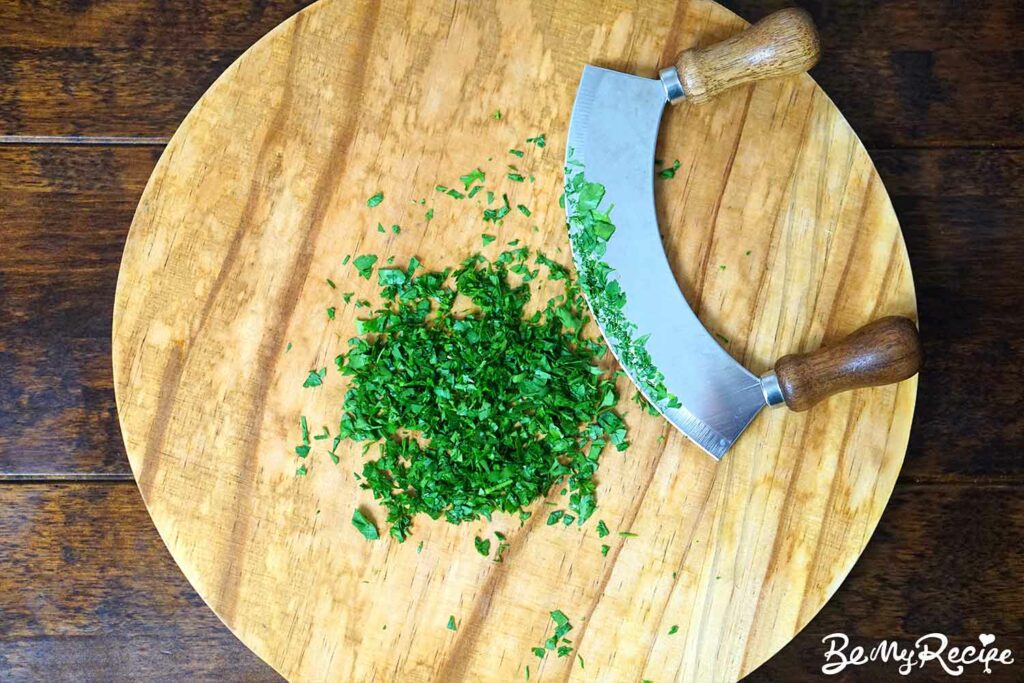 Chopping parsley with a mezzaluna