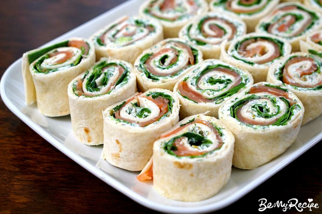 Smoked Salmon Tortilla Roll-Ups (with Herb Cream Cheese, Lemon, Capers, and Spinach)